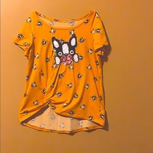 I am selling a kids cropped Cow printed tee